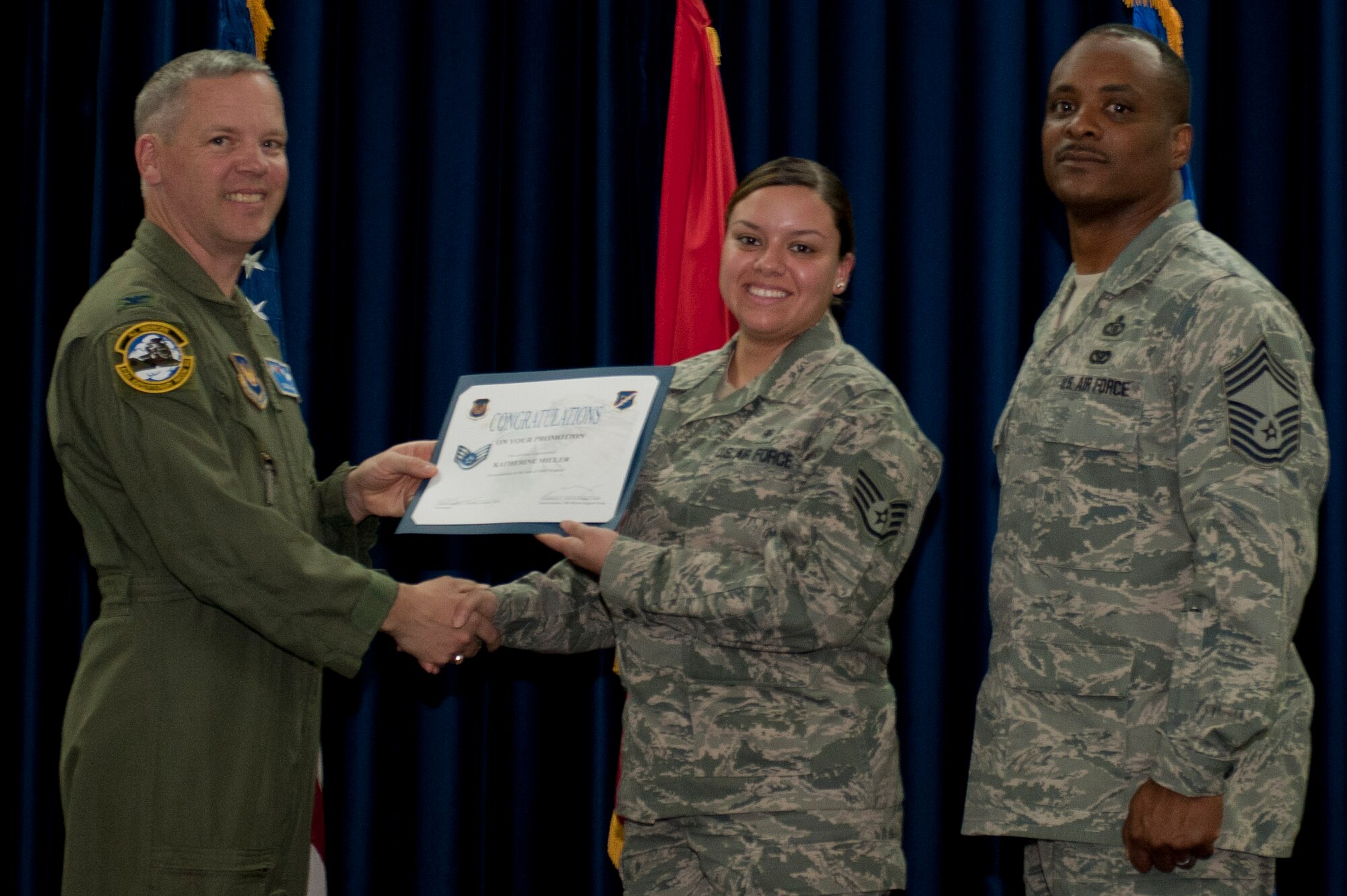 Katherine Miller, 39th Medical Operations Squadron, is promoted to the rank of staff sergeant March 30, 2012, at the Club Complex ballroom at Incirlik Air Base, Turkey. (U.S. Air Force photo by Senior Airman Anthony Sanchelli/Released)