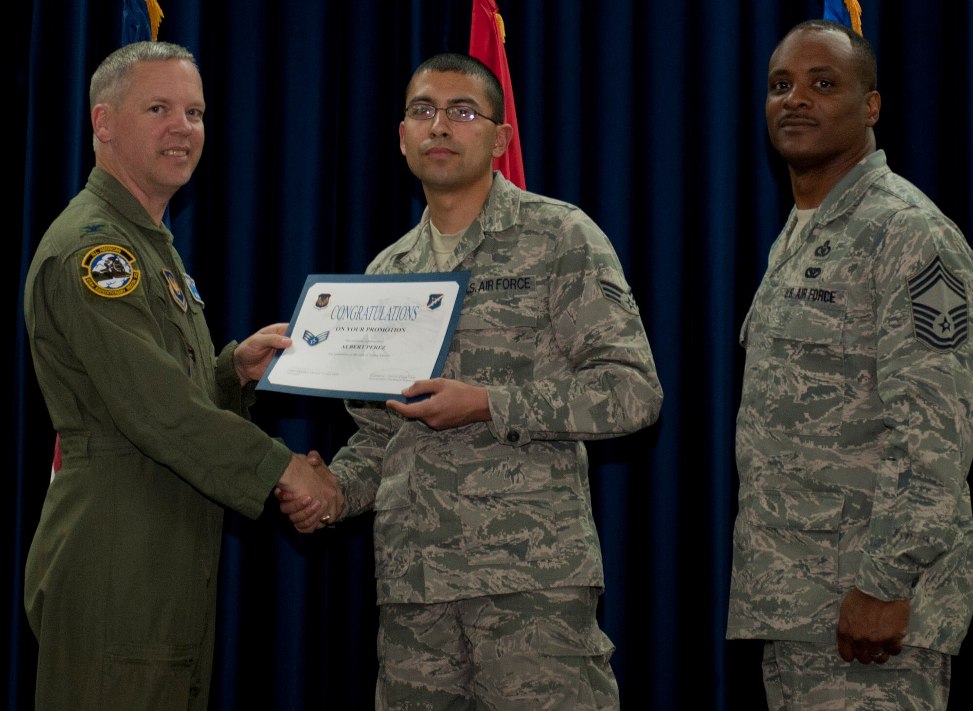 Albert Perez, 39th Logistics Readiness Squadron, is promoted to the rank of senior airman March 30, 2012, at the Club Complex ballroom at Incirlik Air Base, Turkey. (U.S. Air Force photo by Senior Airman Anthony Sanchelli/Released)