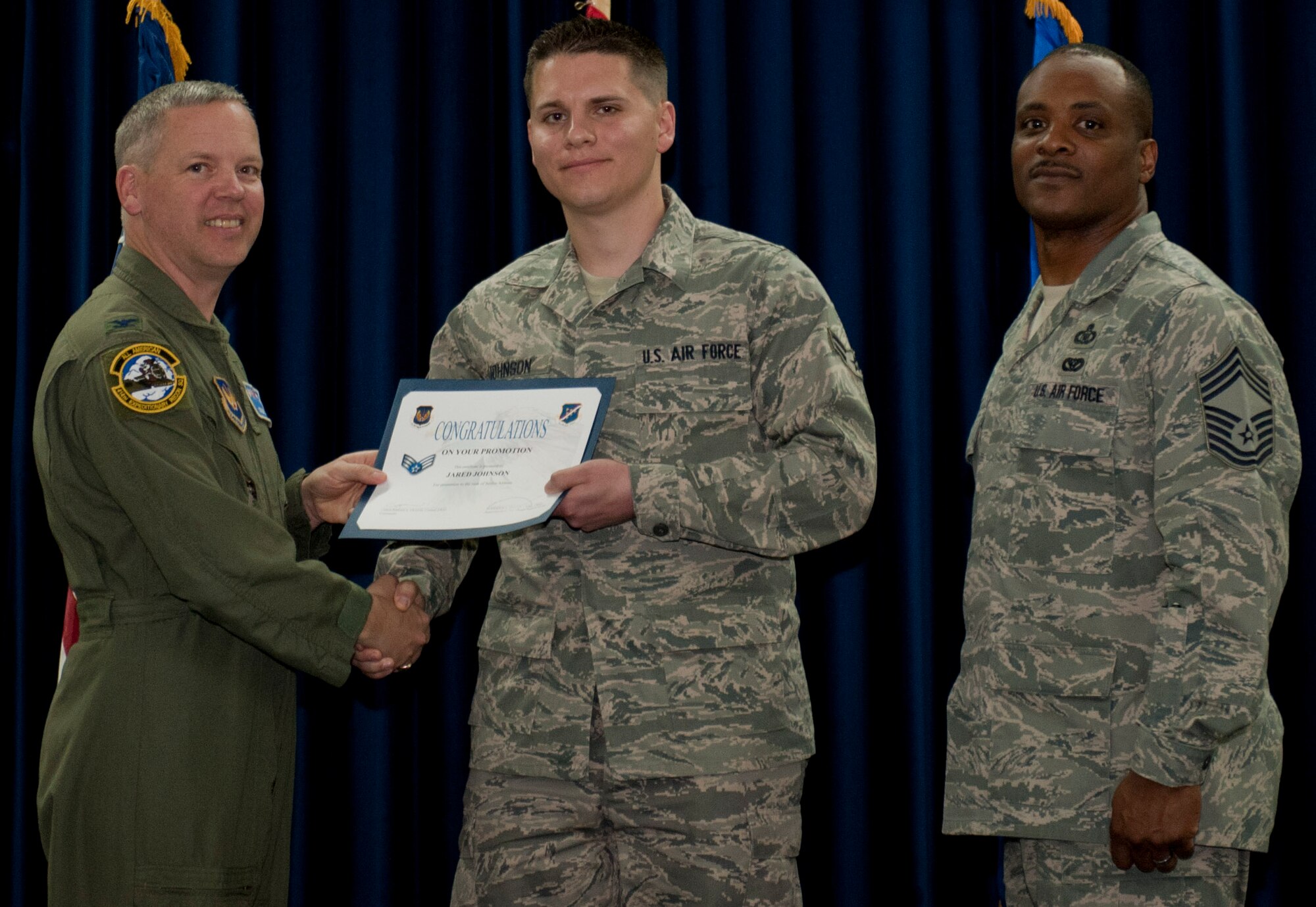 Jared Johnson, 39th Medical Operations Squadron, is promoted to the rank of senior airman March 30, 2012, at the Club Complex ballroom at Incirlik Air Base, Turkey. (U.S. Air Force photo by Senior Airman Anthony Sanchelli/Released)