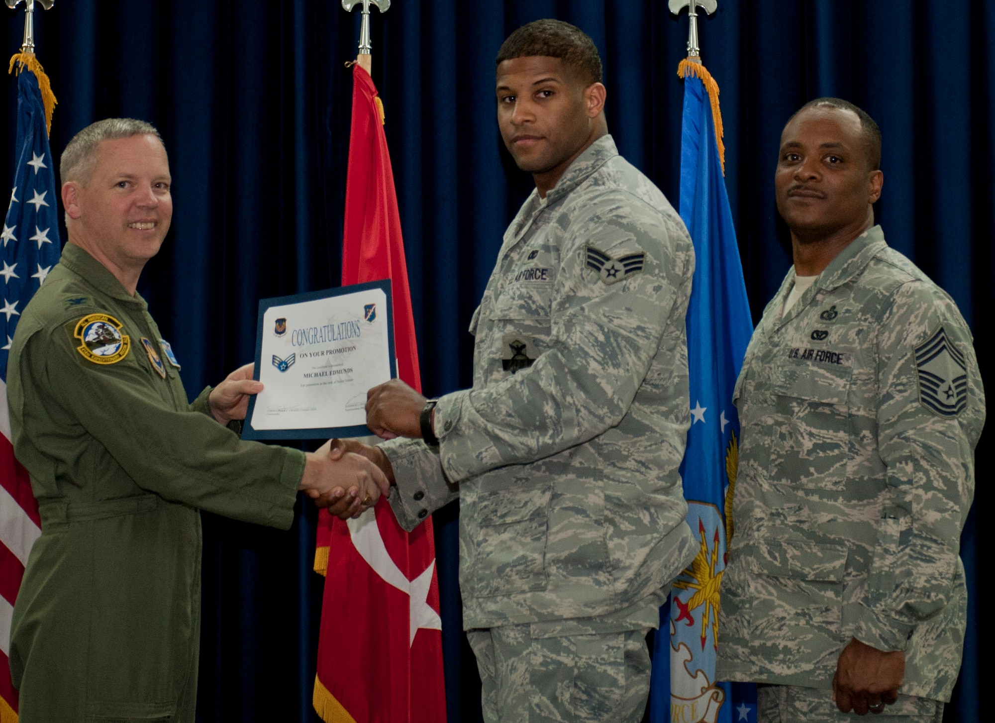 Michael Edmunds, 39th Security Forces Squadron, is promoted to the rank of senior airman March 30, 2012, at the Club Complex ballroom at Incirlik Air Base, Turkey. (U.S. Air Force photo by Senior Airman Anthony Sanchelli/Released)