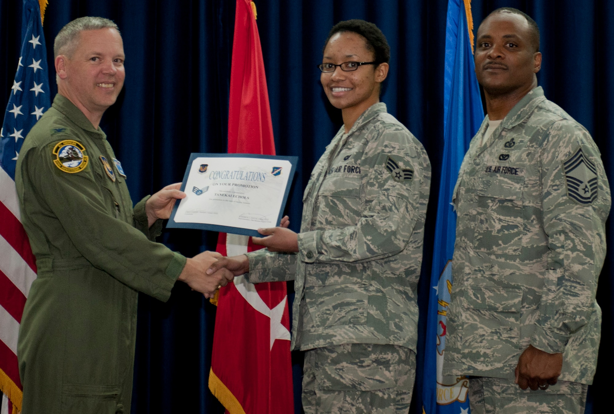 Tanekai Echols, 39th Communications Squadron, is promoted to the rank of senior airman March 30, 2012, at the Club Complex ballroom at Incirlik Air Base, Turkey. (U.S. Air Force photo by Senior Airman Anthony Sanchelli/Released)
