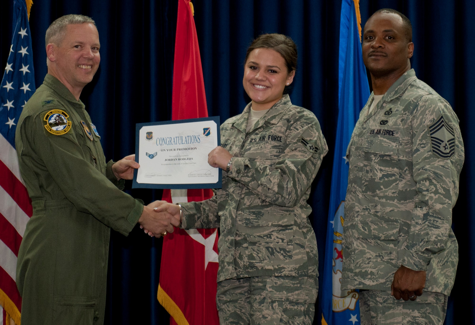 Jordan Rodgers, 39th Air Base Wing, is promoted to the rank of airman first class March 30, 2012, at the Club Complex ballroom at Incirlik Air Base, Turkey. (U.S. Air Force photo by Senior Airman Anthony Sanchelli/Released)