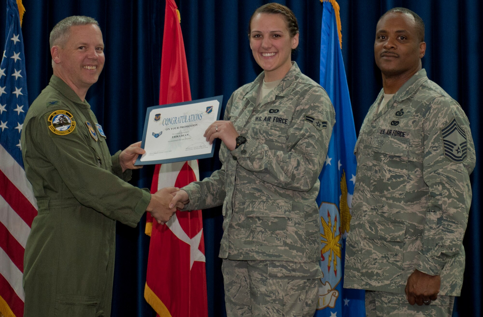 Erika Bean, 39th Operations Squadron, is promoted to the rank of airman first class March 30, 2012, at the Club Complex ballroom at Incirlik Air Base, Turkey. (U.S. Air Force photo by Senior Airman Anthony Sanchelli/Released)