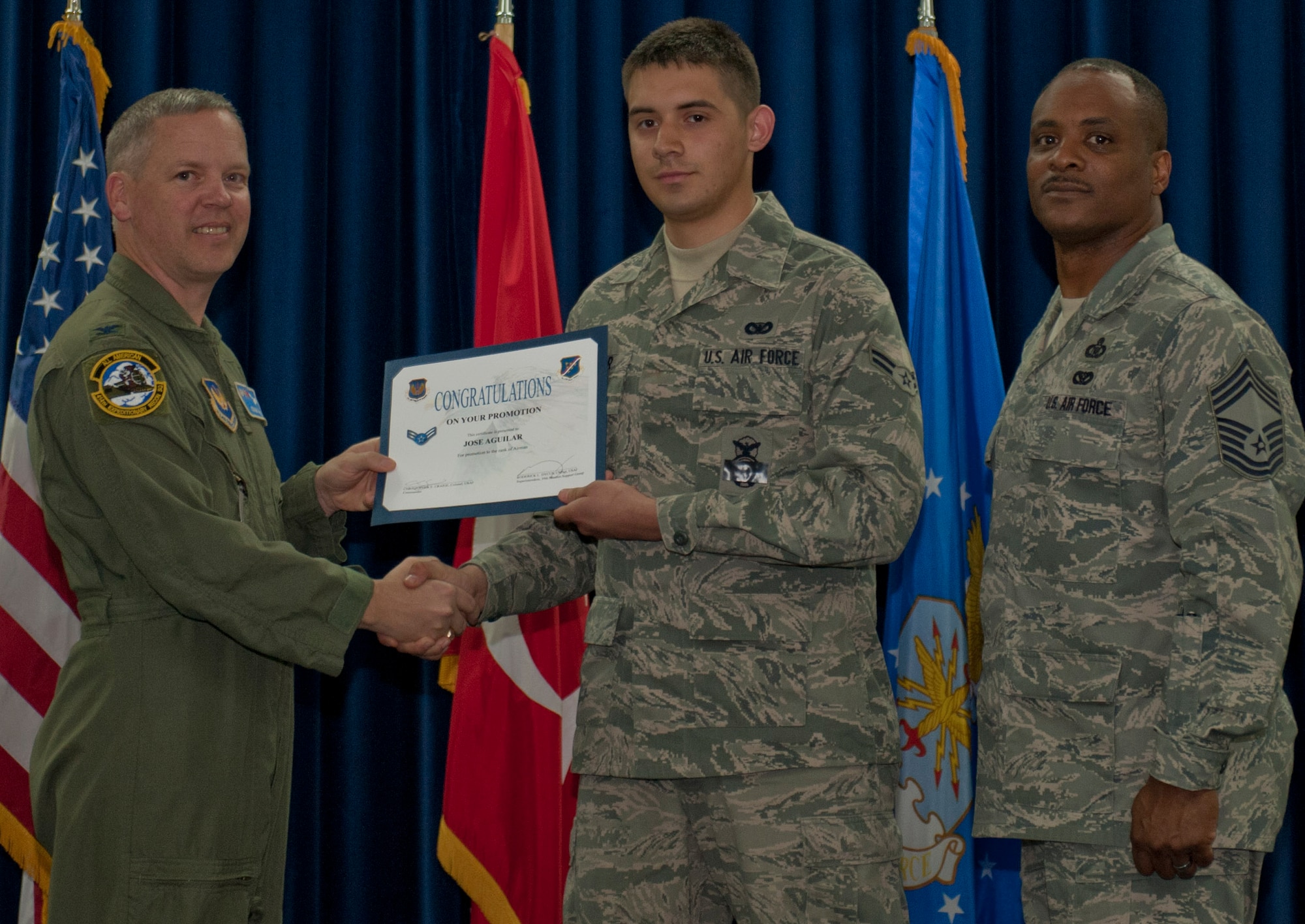 Jose Aguilar, 39th Security Forces Squadron, is promoted to the rank of airman first class March 30, 2012, at the Club Complex ballroom at Incirlik Air Base, Turkey. (U.S. Air Force photo by Senior Airman Anthony Sanchelli/Released)