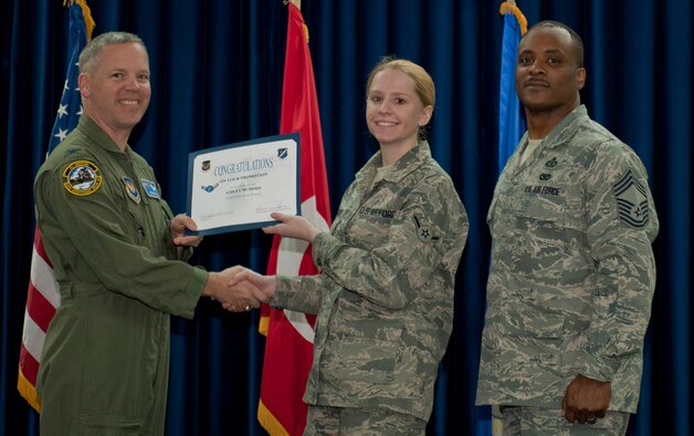 Ashley McBride, 728th Air Mobility Squadron, is promoted to the rank of airman March 30, 2012, at the Club Complex ballroom at Incirlik Air Base, Turkey. (U.S. Air Force photo by Senior Airman Anthony Sanchelli/Released)