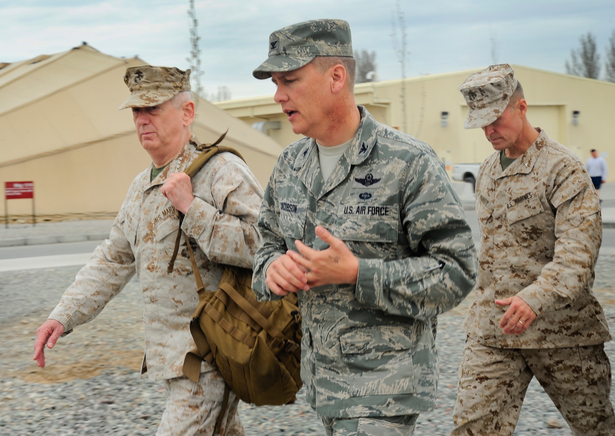 U.S. Marine Corps Gen. James Mattis receives a walking tour of the Transit Center at Manas, Kyrgyzstan from U.S. Air Force Col. James Jacobson April 1, 2012, during Mattis' visit here. Mattis is the commander of U.S. Central Command and Jacobson is the commander of the 376th Air Expeditionary Wing. (U.S. Air Force photo/Staff Sgt. Angela Ruiz)