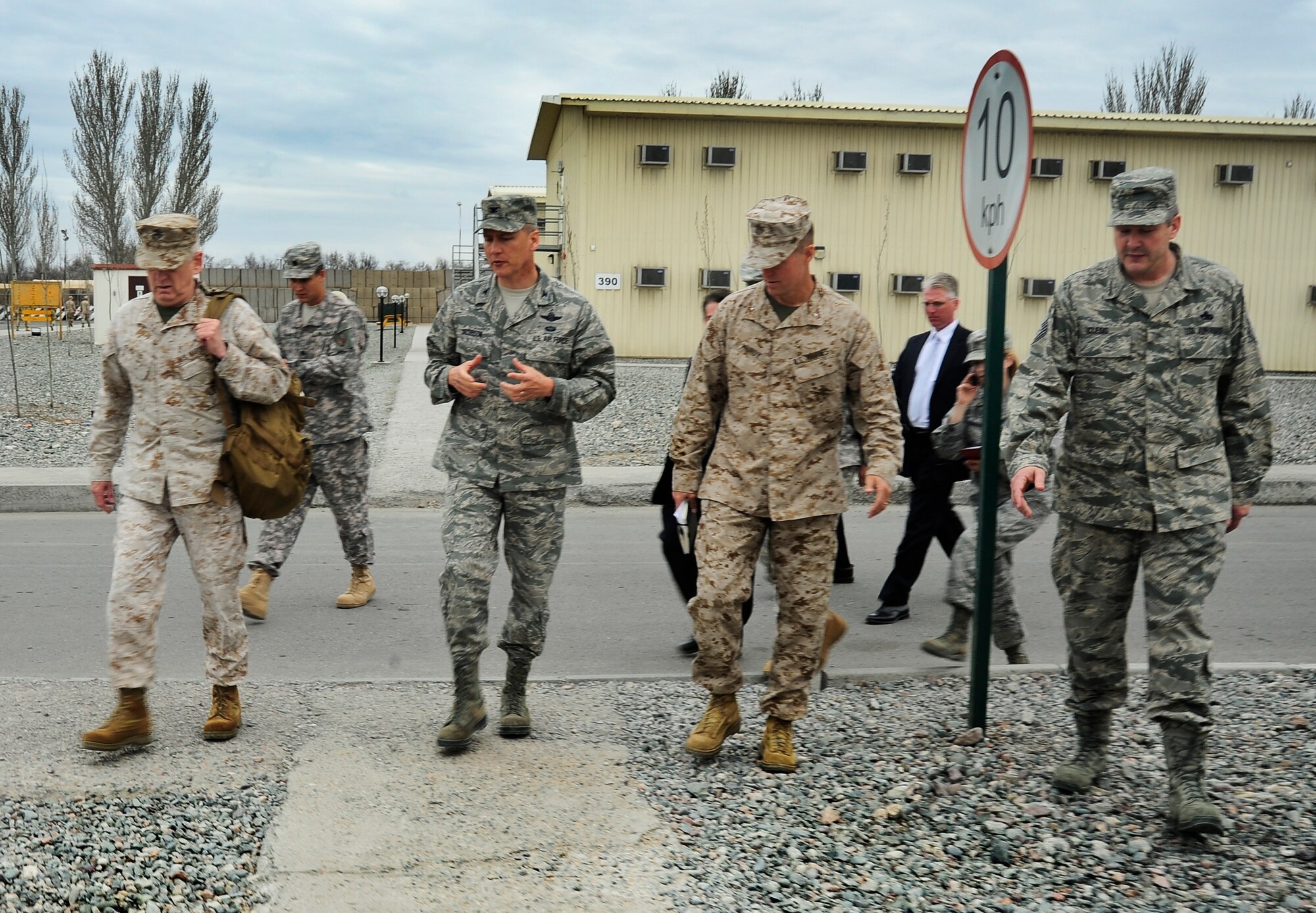 (left to right) U.S. Marine Corps Gen. James Mattis, U.S. Air Force Col. James Jacobson, U.S. Marine Corps Brig. Gen. Carl Mundy and U.S. Air Force Chief Master Sgt. Mark Clegg tour the Transit Center at Manas, Kyrgyzstan, April 1, 2012. Mattis is the commander of U.S. Central Command and Jacobson is the commander of the 376th Air Expeditionary Wing. Mundy is the USCENTCOM commander's executive officer and Clegg is the 376th AEW acting Command Chief. (U.S. Air Force photo/Staff Sgt. Angela Ruiz)