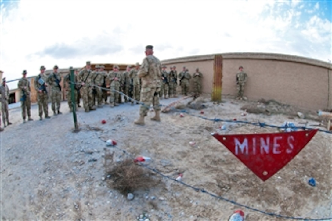 U.S. Army Sgt. 1st Class Adam Cason teaches soldiers how to recognize mine fields at Bagram Air Field, Afghanistan, on March 25, 2012.  Experts estimate that there are upwards of 10 million mines and other unexploded ordnance buried in the ground in Afghanistan.  