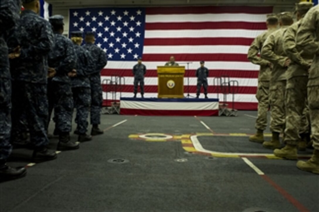 Secretary of Defense Leon E. Panetta speaks to sailors and Marines on board the USS Peleliu LHA 5 in the Pacific Ocean off the coast of San Diego, Calif., on March 30, 2012. 	Panetta visited several areas on board the ship as well as viewing flight ops on deck.  