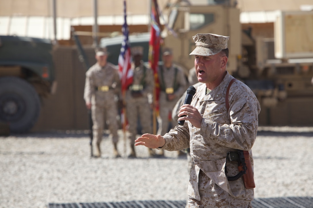 Brig. Gen. John Broadmeadow, commanding general, 1st Marine Logistics Group (Forward), speaks to incoming and outgoing Marines and sailors at a transfer of authority ceremony for Marine Air-Ground Task Force Support Battalion 11.2 at Camp Leatherneck, Afghanistan, April 3.