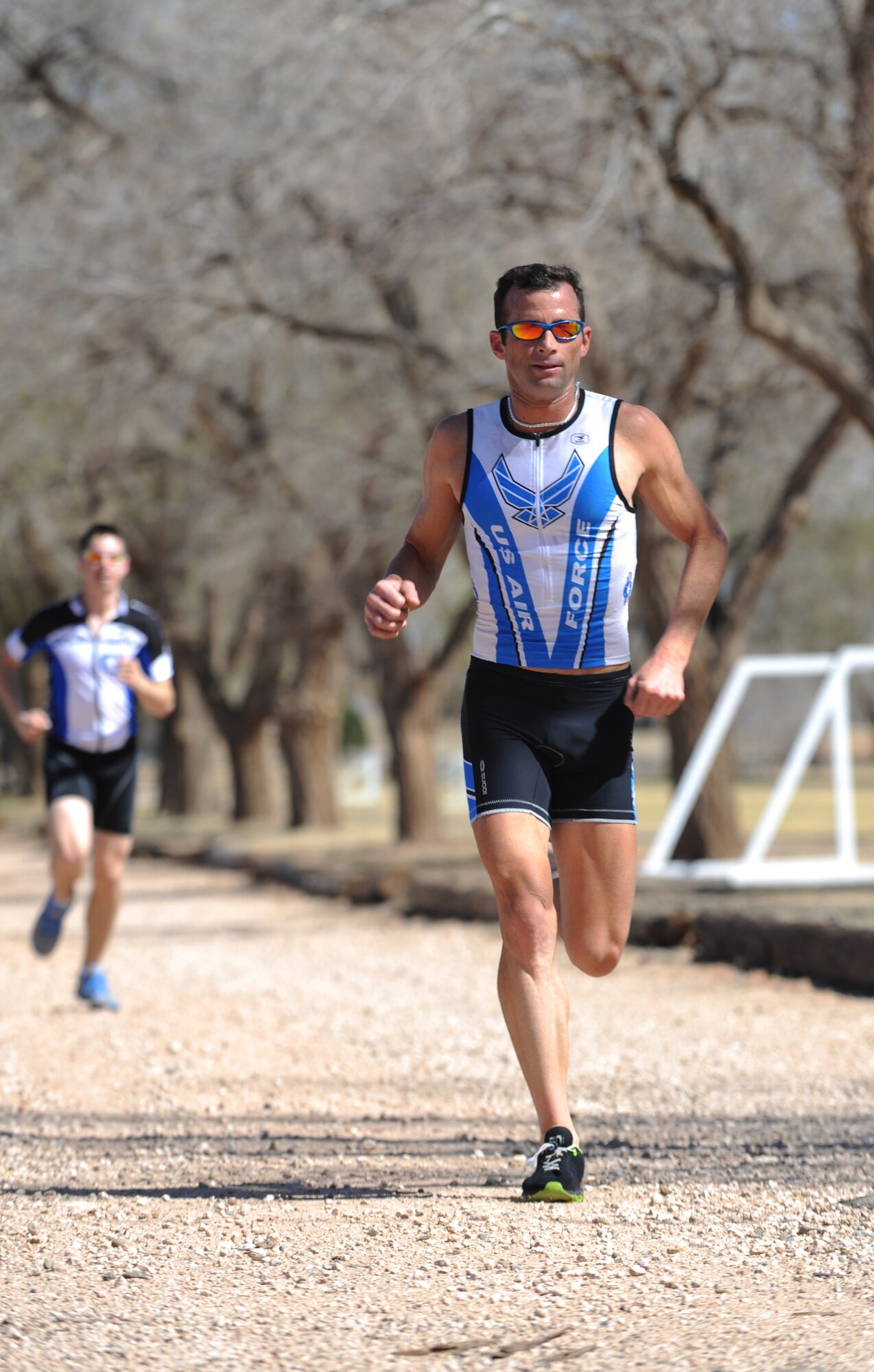 U.S. Air Force Capt. Kenneth Corigliano, 56th Intelligence Squadron, practices sprints near a park in Clovis, N.M., March 20, 2012. Corigliano was selected as the Air Commando of the month for April, highlighting physical fitness, one of Air Force Special Operations Command?s 13 Critical Attributes. (U.S. Air Force photo by Senior Airman Jette Carr)  