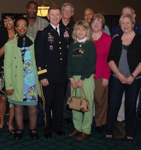 U.S. Army Maj. Gen. Arthur Bartell, Army Capabilities Integration Center deputy director and chief of staff, met with Gold Star family members during the intermission of the U.S. Army Training and Doctrine Command Band's "sold out" spring concert  performance at the Ferguson Center for the Performing Arts, March 24. The Gold Star family members were recognized by a standing ovation by more than 1,800 in attendance, as Bartell thanked the family members for their sacrifice. (U.S. Army photo by Frederick Poole/Released)
