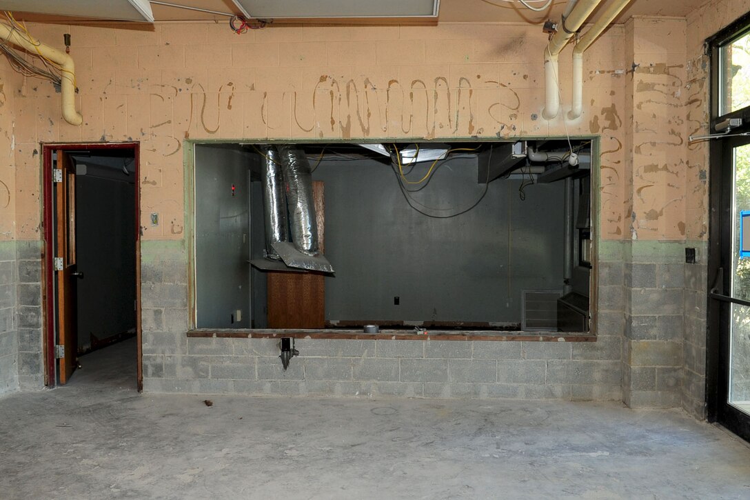 The issuing counter of the Anderson Field House awaits completion at Fort Eustis, Va., April 3, 2012.  The construction workers are still in the planning process of making the counter a juice bar and a concession stand will be built on the other side of the lobby. (U.S. Air Force photo by Ashley Hawkins/Released)