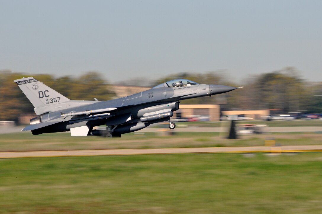 A Washington D.C. Air National Guard F-16 Fighting Falcon returns from a training mission April 3, 2012, at Joint Base Andrews Md. The DC ANG provides air sovereignty forces to defend the National Capital Region and also provides fighter, airlift and support forces capable of local, national and global employment. (U.S. Air Force Photo/Senior Airman Perry Aston)