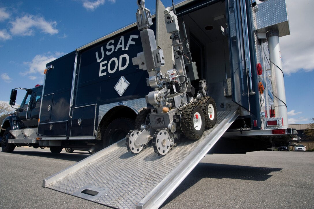 A remotely controlled F-6A Robot rolls down a ramp in search of a simulated Improvised Explosive Device during training held by the 11th Civil Engineer Squadron Explosive Ordnance Disposal members near the EOD building here Mar. 29.  (Photo/Bobby Jones)