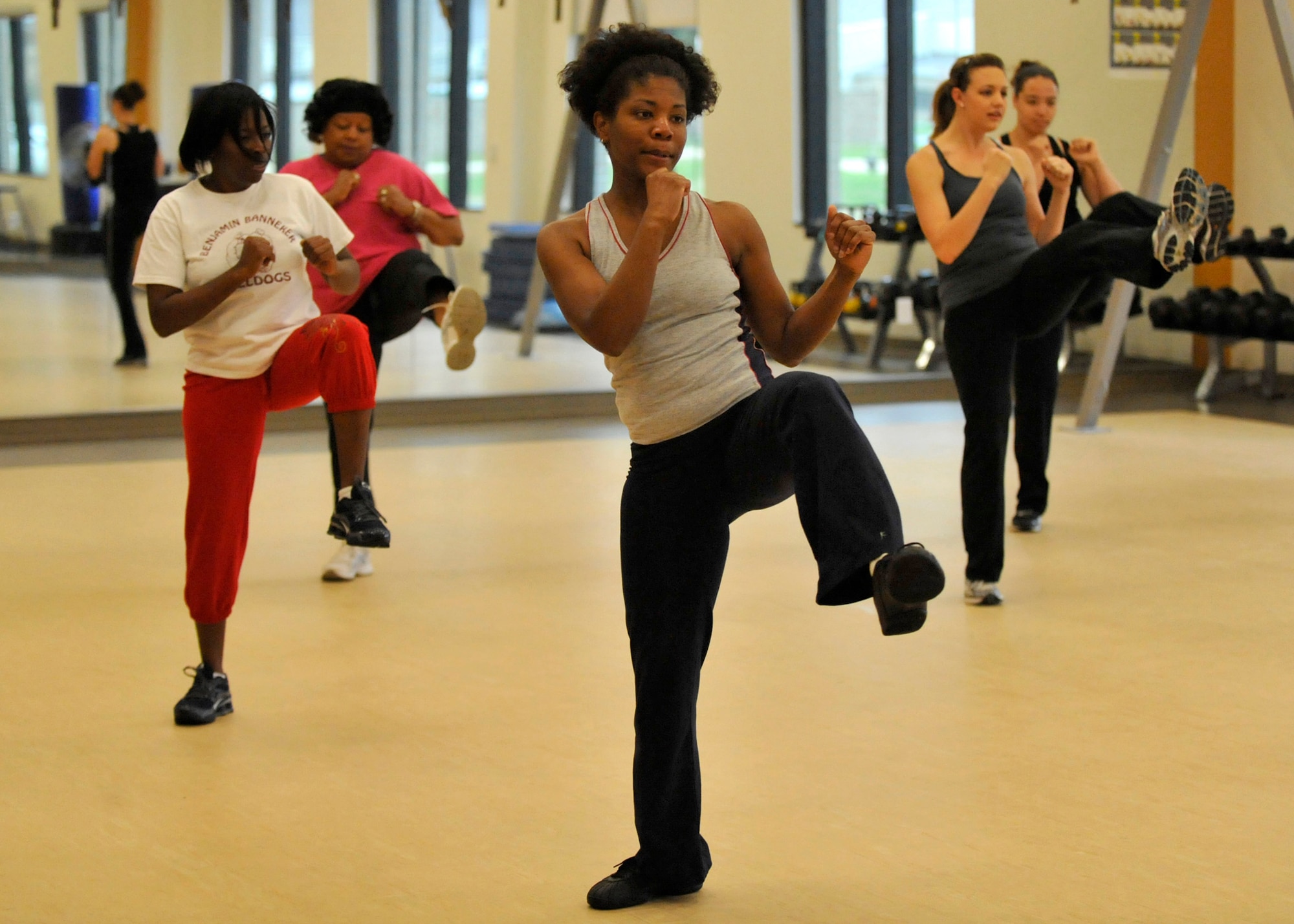 Team Dover members participate in fitness classes provided by the Dover Air Force Base, Del., Fitness Center. These classes are aimed at keeping members fit to fight through a variety of innovative and entertaining programs. (U.S. Air Force photos by Tech. Sgt. Chuck Walker)