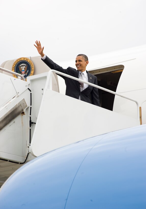 President Barack Obama waves to an audience prior to his departure from Joint Base Andrews on March 30. (Photo/Bobby Jones)
