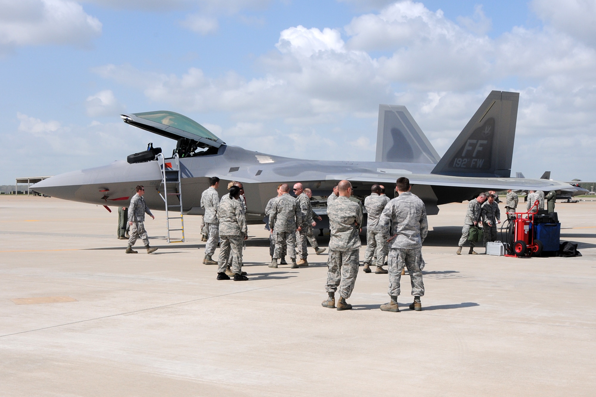 192nd Fighter Wing Airmen view the wing’s new flagship F-22 Raptor at Langley Air Force Base, Va., March 22, 2012.  The aircraft bears tail number 09-0192, which shares the namesake of the Virginia Air National Guard unit. (National Guard Photo by Master Sgt. Carlos J. Claudio/Released)