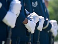 Members of the Joint Base San Antonio- Randolph  Honor Guard stand at parade rest during a wreath- laying ceremony at the Missing Man Monument. The ceremony and 15th annual POW/MIA Symposium were highlights of the Freedom Flyer Reunion March 30 at Joint Base San Antonio-Randolph. (U.S. Air Force Photo by Benjamin Faske)