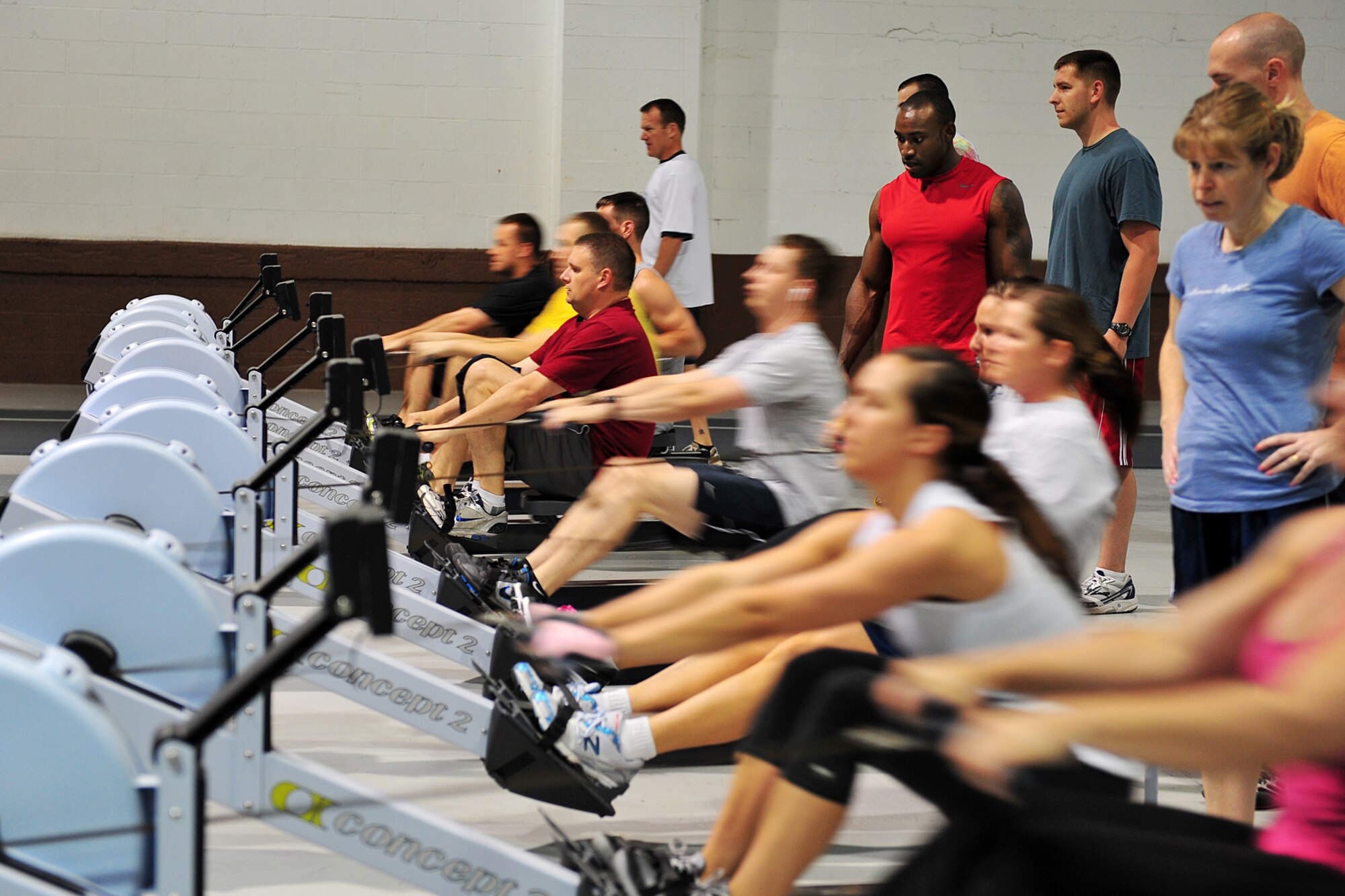 U.S. Air Force Master Sgt. Bradford Godwin, Air Force Weather Agency, uses the concepts two rower with other Team Offutt members during the tactical fitness class in the field house on Offutt Air Force Base, Neb., April 2. 

(U.S. Air Force photo by Charles Haymond/Released)