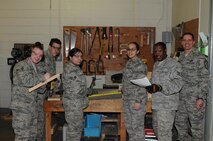 MINOT AIR FORCE BASE, N.D. -- Left to right: Senior Airman Branden Metzner, Airman 1st Class Juan Soto, Senior Airman Mariana Hernandez-Chavez, Senior Airman Dorixa James, Staff Sgt. Richard Jones.

The 5th Logistics Readiness Squadron TMO cargo movement element is the central receiving and distribution processing center for weapons-related material, classified, and arms ammunition and explosives for the 5th Bomb Wing and 91 Missile Wing. The team ensures shipment integrity by properly verifying packing and transporting these critical assets, thus ensuring Nuclear Deterrence and sustaining war fighting capabilities. The agency currently consists of eight personnel. (Photo Submission/Tech. Sgt. Mark Frederici)

