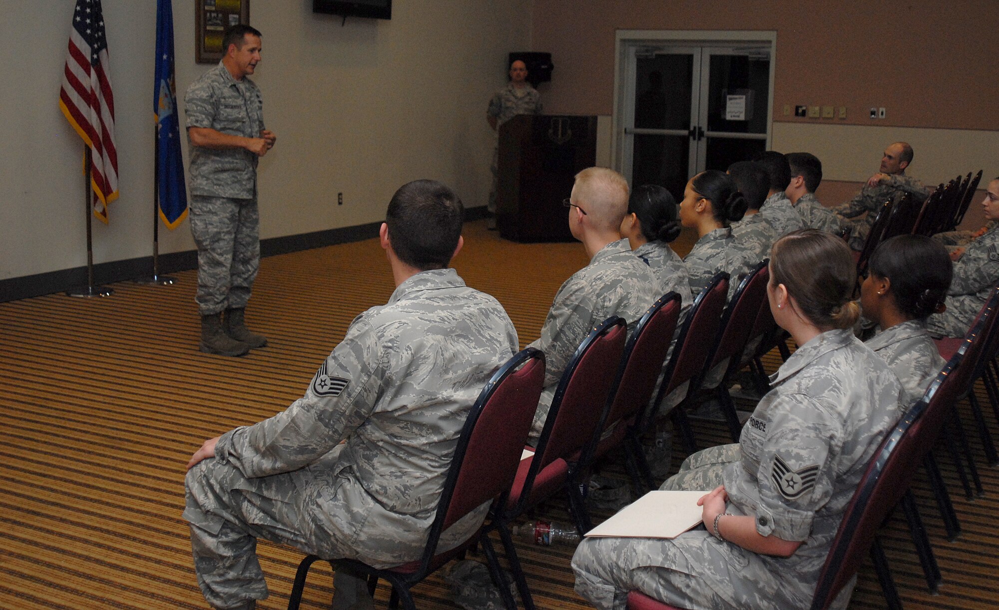 GOODFELLOW AIR FORCE BASE, Texas-- Col. Paul Bugenske, 17th Mission Support Group Commander, talks to the newest base Honor Guard graduates March 30. Honor Guard training helps members become proficient at funeral details, Posting the Colors, and a variety of other duties, over the time period of a week. (U.S. Air Force photo/ Airman 1st Class Michael Smith)