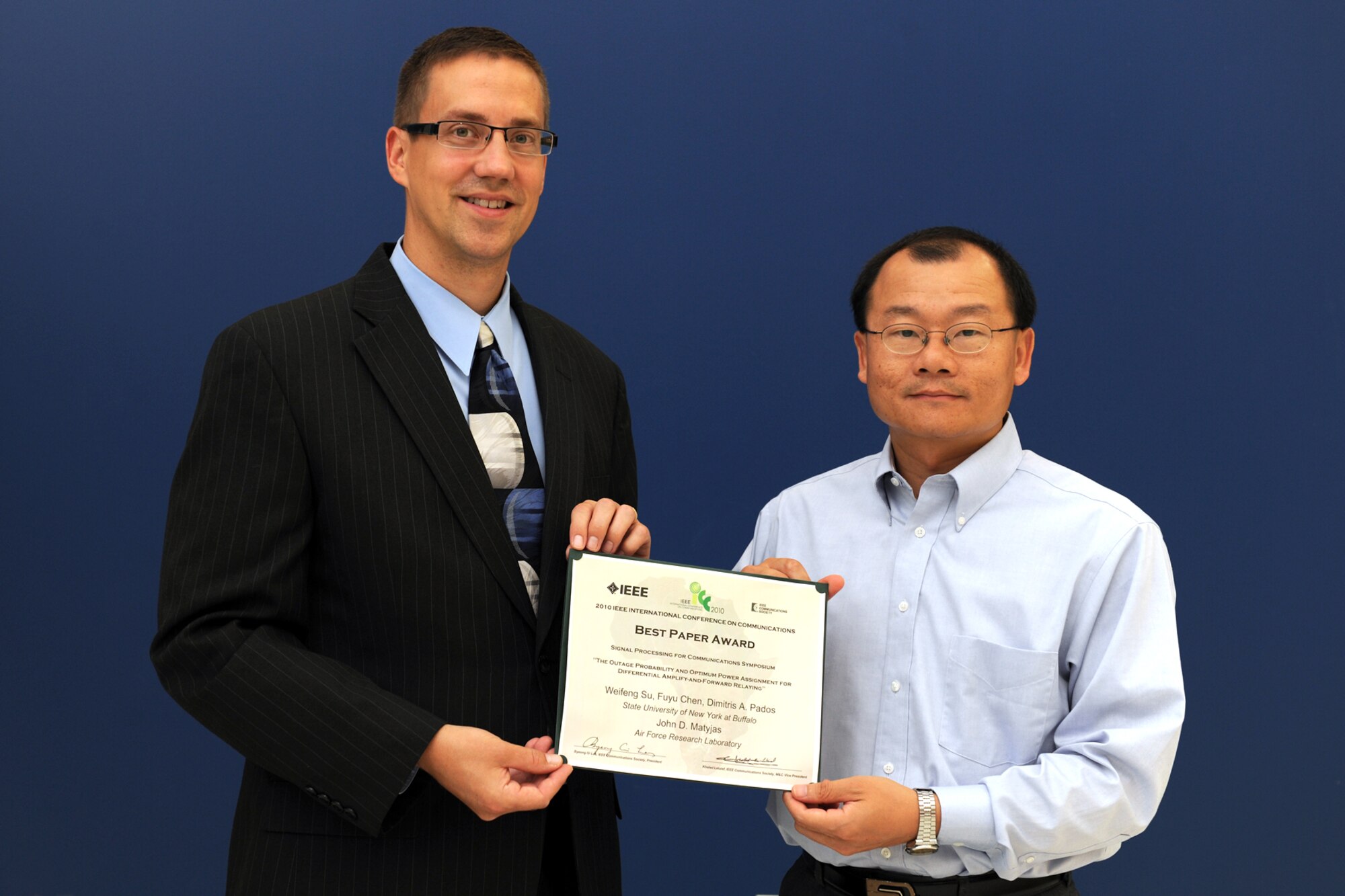 Air Force Research Laboratory adviser Dr. John Matyjas, and AFRL NRC Associate Dr. Weifeng Su, received the 2010 IEEE International Conference on Communications (ICC) Best Paper Award during IEEE ICC 2010 on 25 May in Cape Town, South Africa.  (AFRL Image)