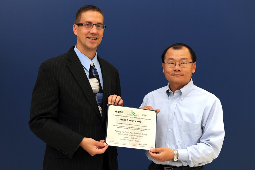 Air Force Research Laboratory adviser Dr. John Matyjas, and AFRL NRC Associate Dr. Weifeng Su, received the 2010 IEEE International Conference on Communications (ICC) Best Paper Award during IEEE ICC 2010 on 25 May in Cape Town, South Africa.  (AFRL Image)