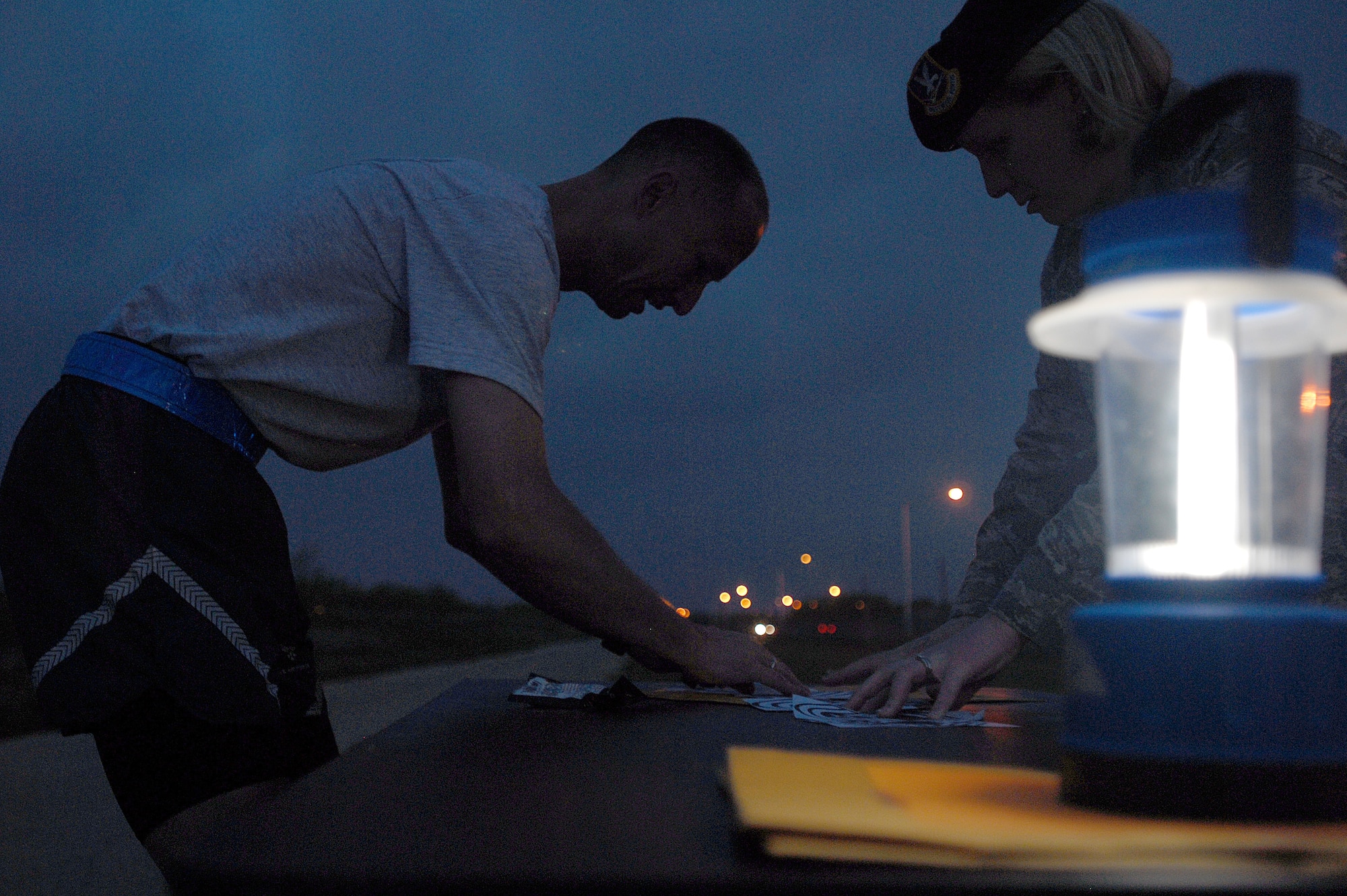 GOODFELLOW AIR FORCE BASE, Texas-- Master Sgt. Douglas Hackelton, 315th Training Squadron, participates in the first challenge of the 2012 Survivor Run, March 30. The three mile run also included three challenges that tested the competitors mentally and physically. (U.S. Air Force photo/ Airman 1st Class Michael Smith)
