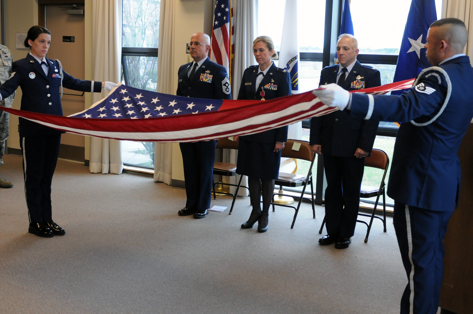 Colonel Christina G. Stevens, formerly the 102nd Intelligence Wing vice commander, concluded her Air Force career in front of her family, close friends and fellow Airmen during a retirement ceremony at Otis Air National Guard Base, Mass., March 31, 2012. Several Airmen whom Stevens served with during her more than 25 years in the Air Force took the opportunity to highlight their experiences with her. (National Guard photo by Senior Airman Patrick McKenna)