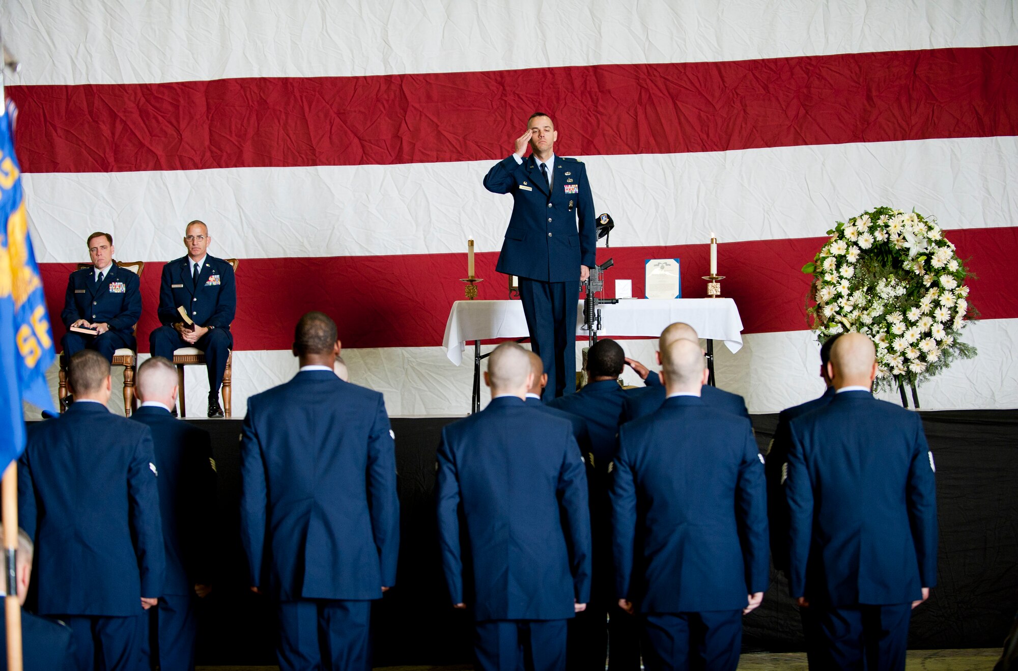 Lt. Col. Brint Woodruff, 39th Security Forces Squadron commander, returns a salute after a final guardmount for Airman 1st Class Joel Barrow during a memorial service March 30, 2012, at Incirlik Air Base, Turkey. The ceremony honored the life of Barrow, a member of the 39th SFS Bravo Flight who died March 27. (U.S. Air Force photo by Senior Airman Clayton Lenhardt/Released)