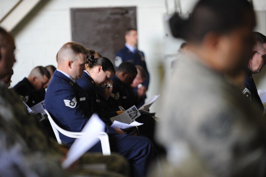Members of the 39th Security Forces Squadron, attend the memorial ceremony for Airman 1st Class Joel Barrow March 30, 2012, at Incirlik Air Base, Turkey. The ceremony honored the life of Barrow, a 39th Security Forces Squadron security response team member who died March 27. (U.S. Air Force photo by Senior Airman Jarvie Z. Wallace/Released) 
