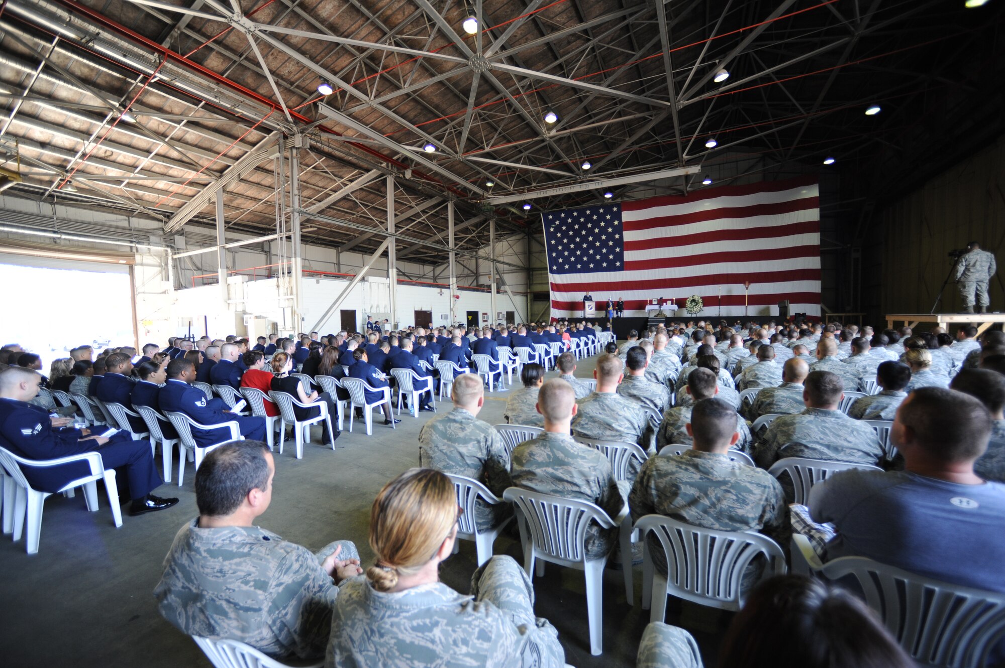 Guests listen during the memorial service for Airman 1st Class Joel Barrow March 30, 2012, at Incirlik Air Base, Turkey. The ceremony honored the life of Barrow, a 39th Security Forces Squadron security response team member who died March 27. (U.S. Air Force photo by Senior Airman Jarvie Z. Wallace/Released) 