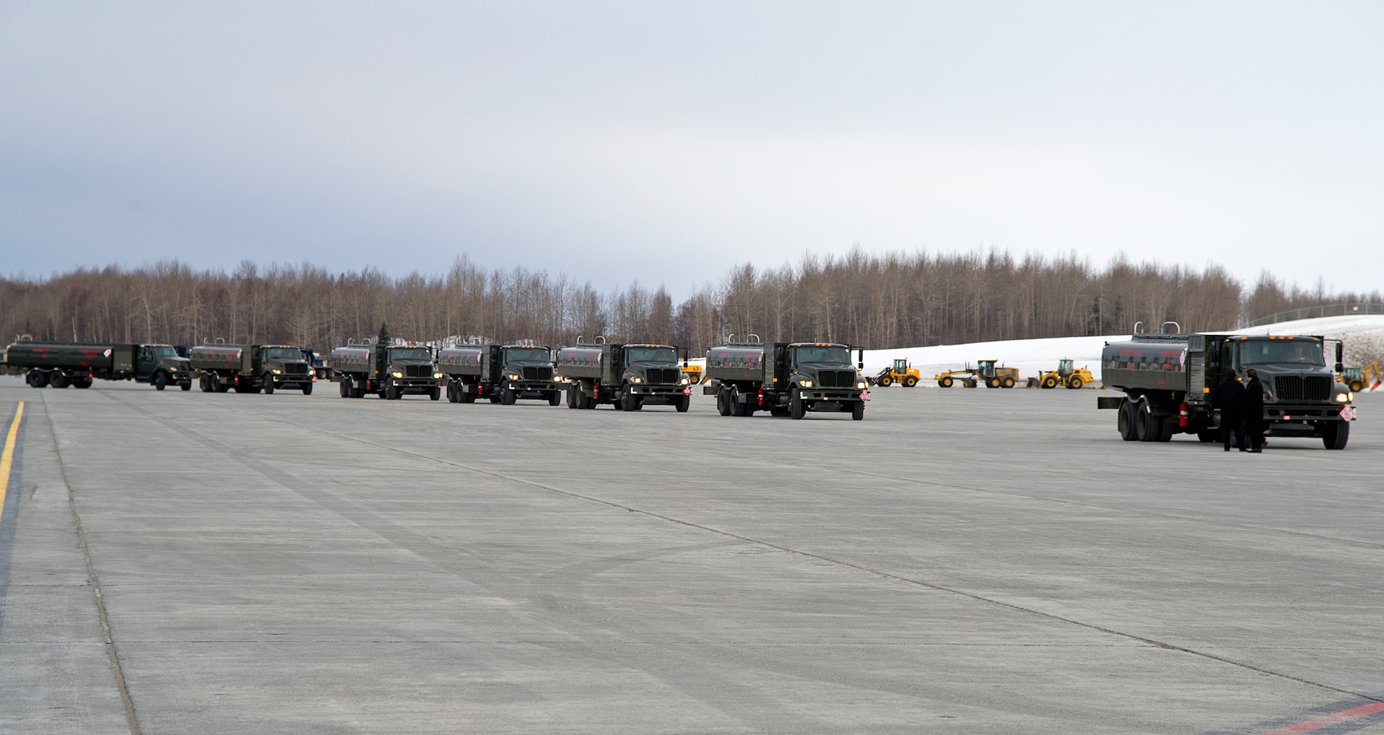 R-11 fuel trucks prepare to deliver to Air Force One on Joint Base Elmendorf-Richardson March 27, 2012. The plane, carrying the President of the United States, landed on JBER to refuel after returning from a visit to the Republic of Korea. (U.S. Air Force photo/Staff Sgt. Zachary Wolf)