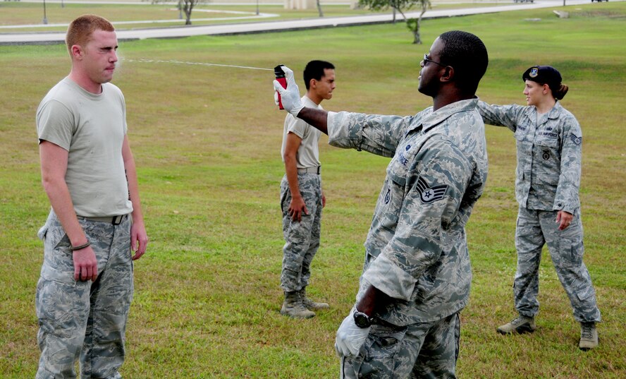 ANDERSEN AIR FORCE BA SE, Guam – Airmen from the 36th Security Forces Squadron are sprayed with pepper spray during routine training scenario March 23. The 36 SFS requires Airmen to receive pepper spray familiarization training as one of there core skills.  (U.S. Air Force photo by Senior Airman Jeffrey Schultze)