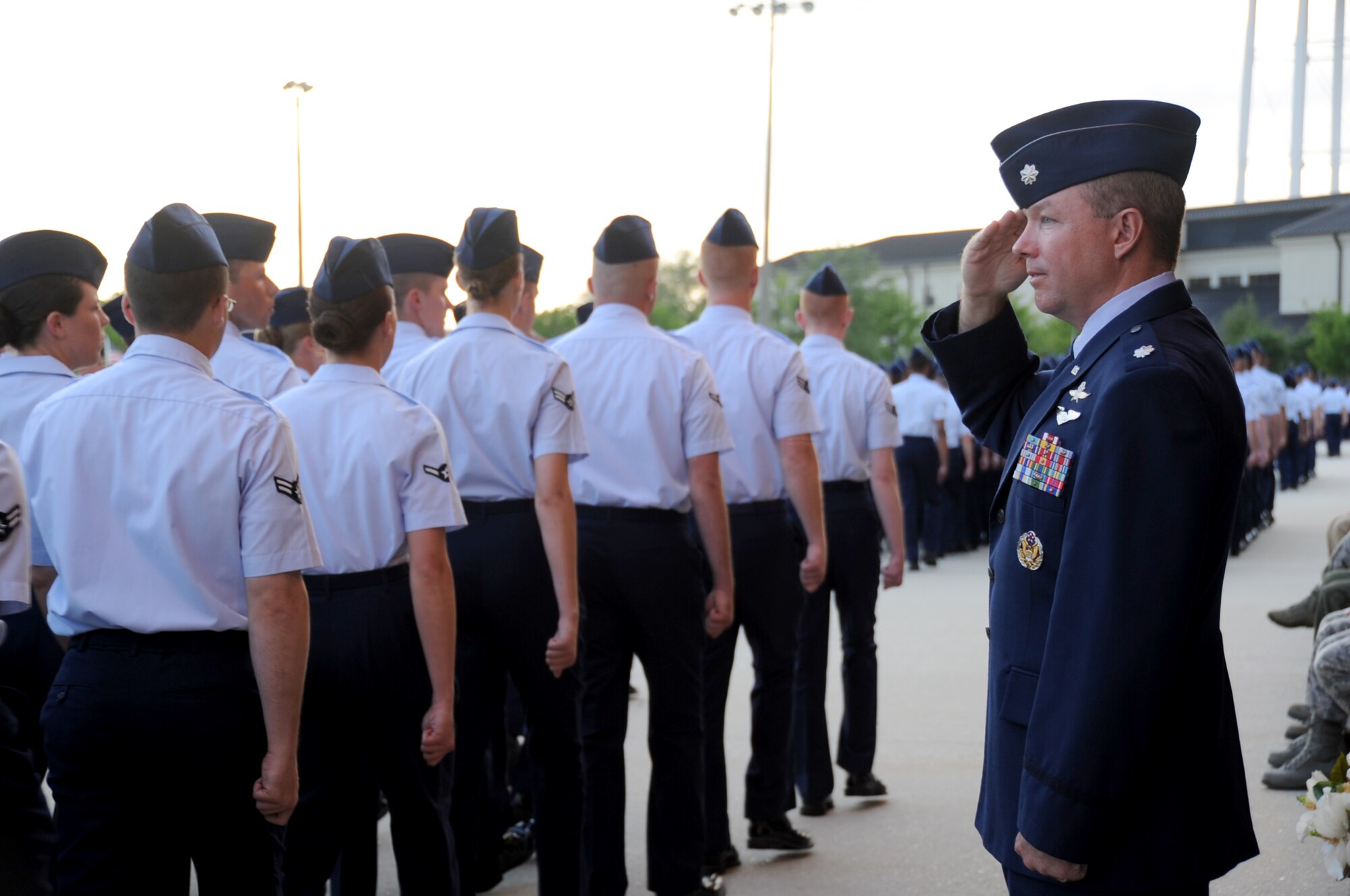 Lt. Col. Scott Solomon, 81st Training Group deputy commander, is the reviewing official as the troops march in command during the student parade March 29, 2012, in the triangle area at Keesler Air Force Base, Miss.  This was Solomon’s final parade before his permanent change of station.  (U.S. Air Force photo by Kemberly Groue)
