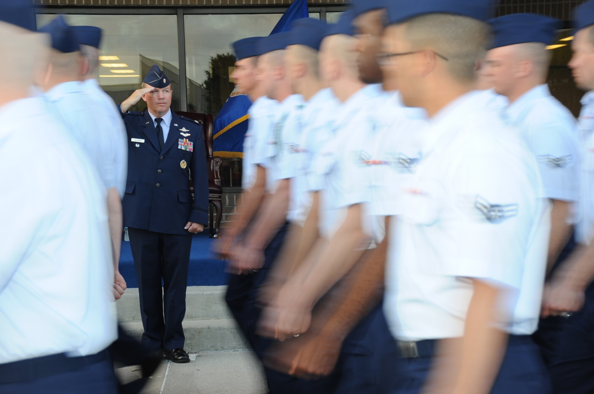 Lt. Col. Scott Solomon, 81st Training Group deputy commander, is the reviewing official as the troops march in command during the student parade March 29, 2012, in the triangle area at Keesler Air Force Base, Miss.  This was Solomon’s final parade before his permanent change of station.  (U.S. Air Force photo by Kemberly Groue)