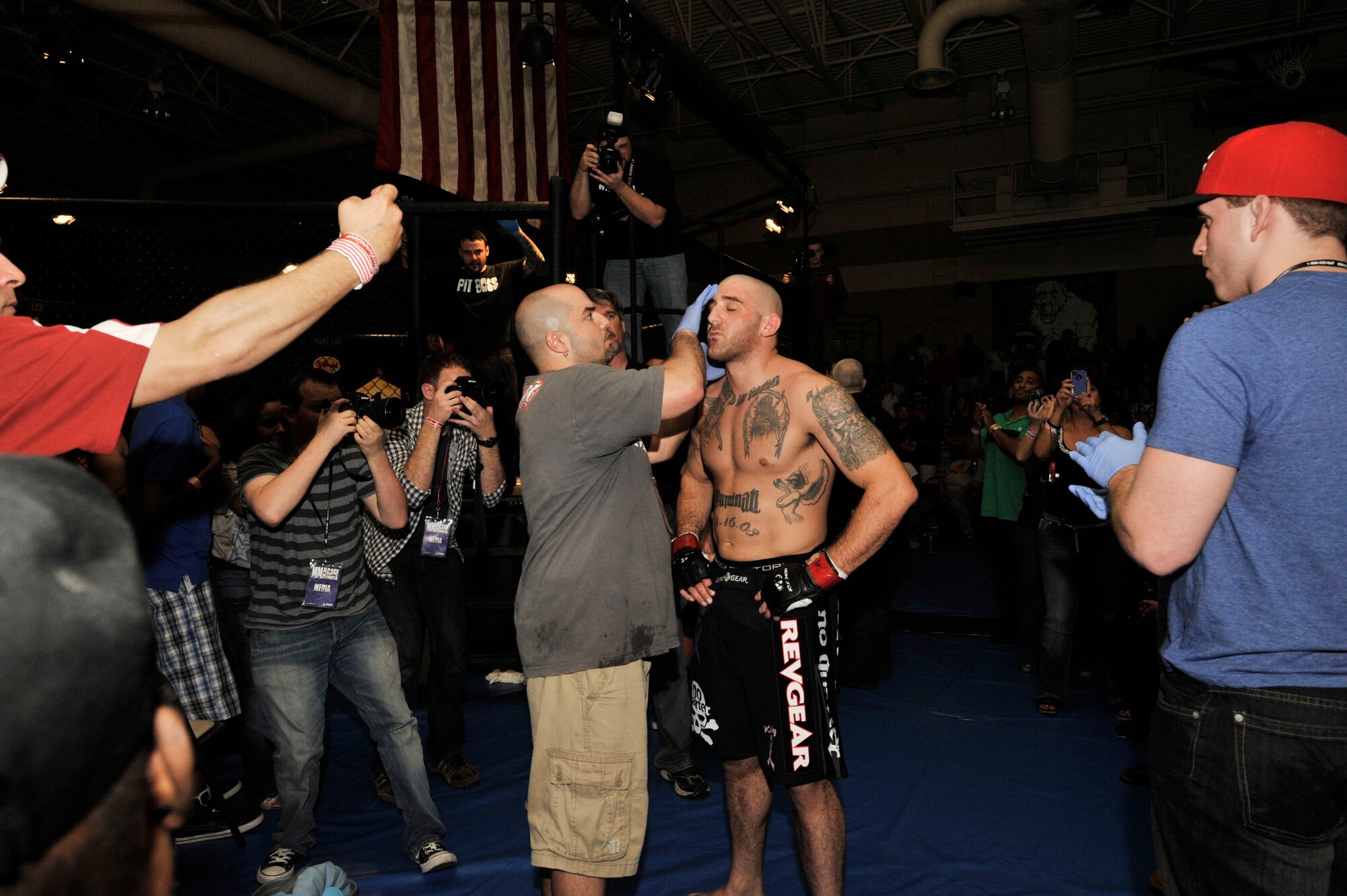 U.S. Air Force Staff. Sgt. Ferdinando Acerra, 20th Maintenance Operations Squadron, maintenance instructor, prepares for his fight against Josheph Pacheco during Fight Lab’s  Mixed Martial Arts event at Shaw's Fitness Center, Shaw Air Force Base, S.C., March 30, 2012.  Acerra retained the title in this fight.(U.S. Air Force photo by Airman Nicole Sikorski/Released)
