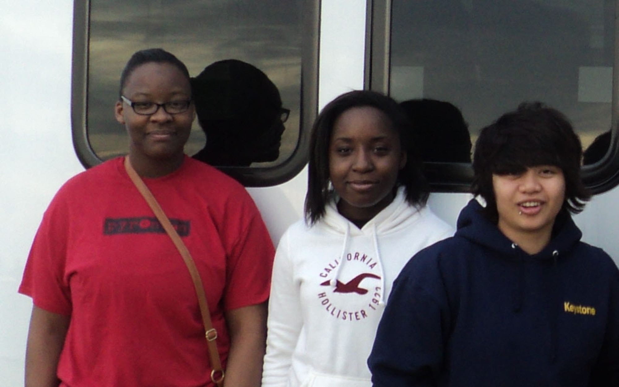Keystone teens Camille Parker, Jahla Blackson and Jess Pinto stop for a photo before leaving for the Boys and Girls Clubs of America 2012 National Keystone Conference in Fort Worth, Texas on March 21, 2012. The Boys and Girls Clubs of America Keystone program, a leadership development experience for teens ages 14 to 18, aims to have a positive impact on members, the club and community by focusing on academic success, career preparations and community service. (U.S. Air Force photo/James L. Hodges)