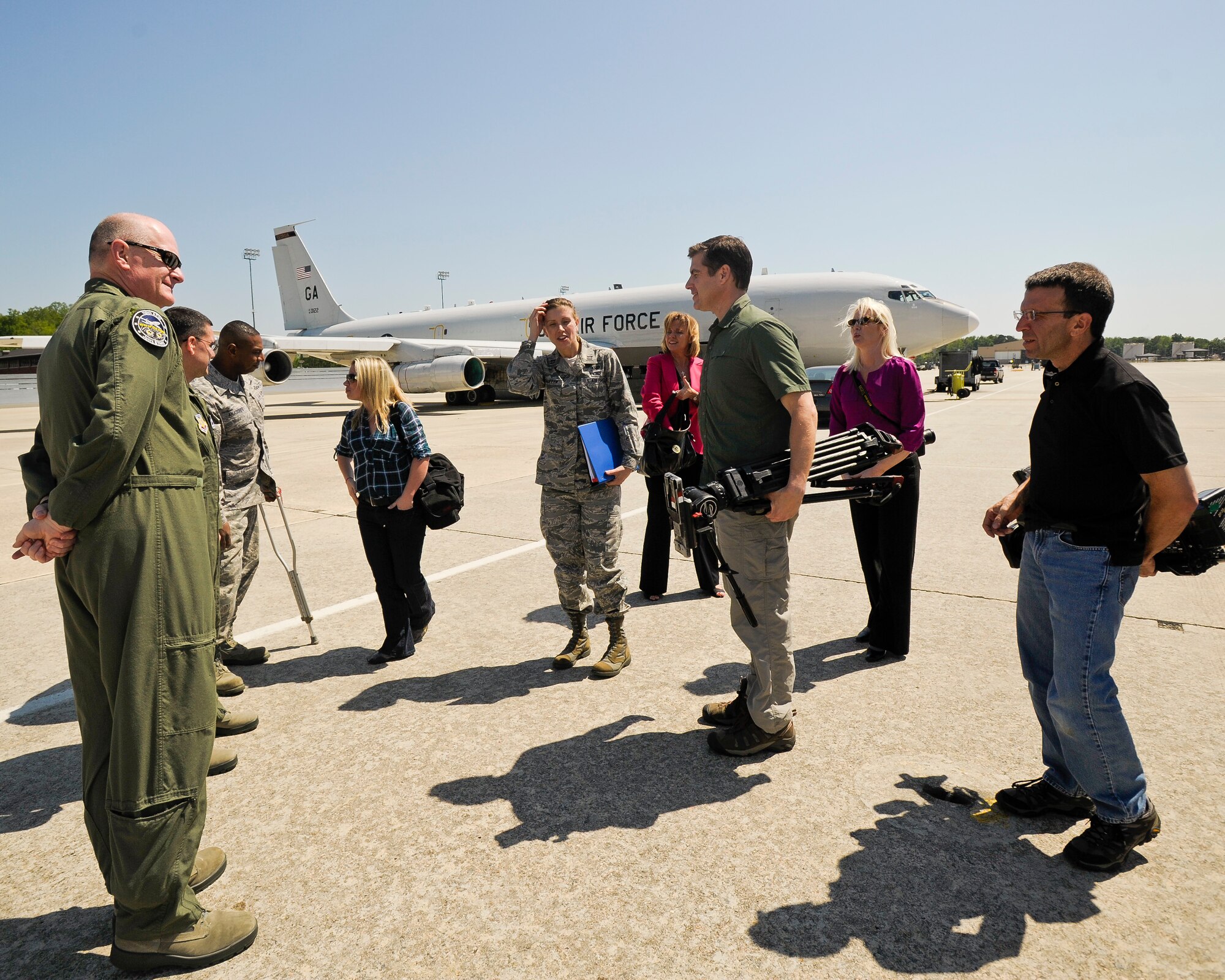 Members from CNN news media meet with Brig. Gen. William Welsh, 116th Air Control Wing commander, left, and other members of Team JSTARS during a tour of the E-8C Joint STARS, Robins Air Force Base, Ga., March 27, 2012.  JSTARS was one of several units the news organization visited during a tour of Robins Air Force Base.  (U. S. Air Force photo by Master Sgt. Roger Parsons)

