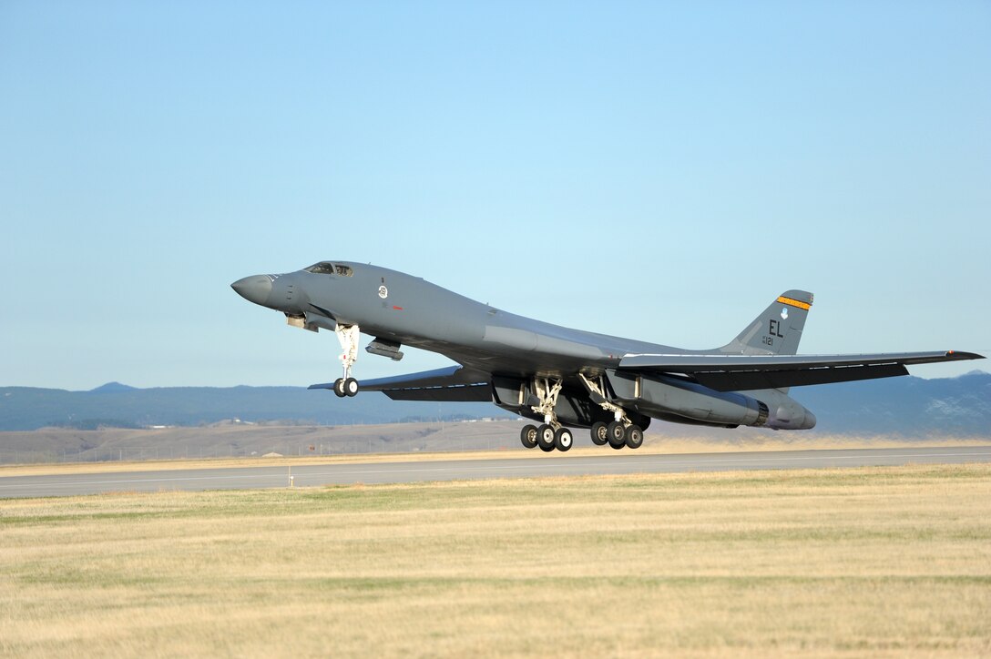A B-1 bomber assigned to the 37th Bomb Squadron rumbles off the flightline at Ellsworth Air Force Base, S.D., April 4, as part of a combat training mission over Fort Yukon, Alaska. The purpose of the exercise is to flex all major muscle movements during the planning and executing phase of a long range strike. (U.S. Air Force photo by Airman Hrair H. Palyan/Released)