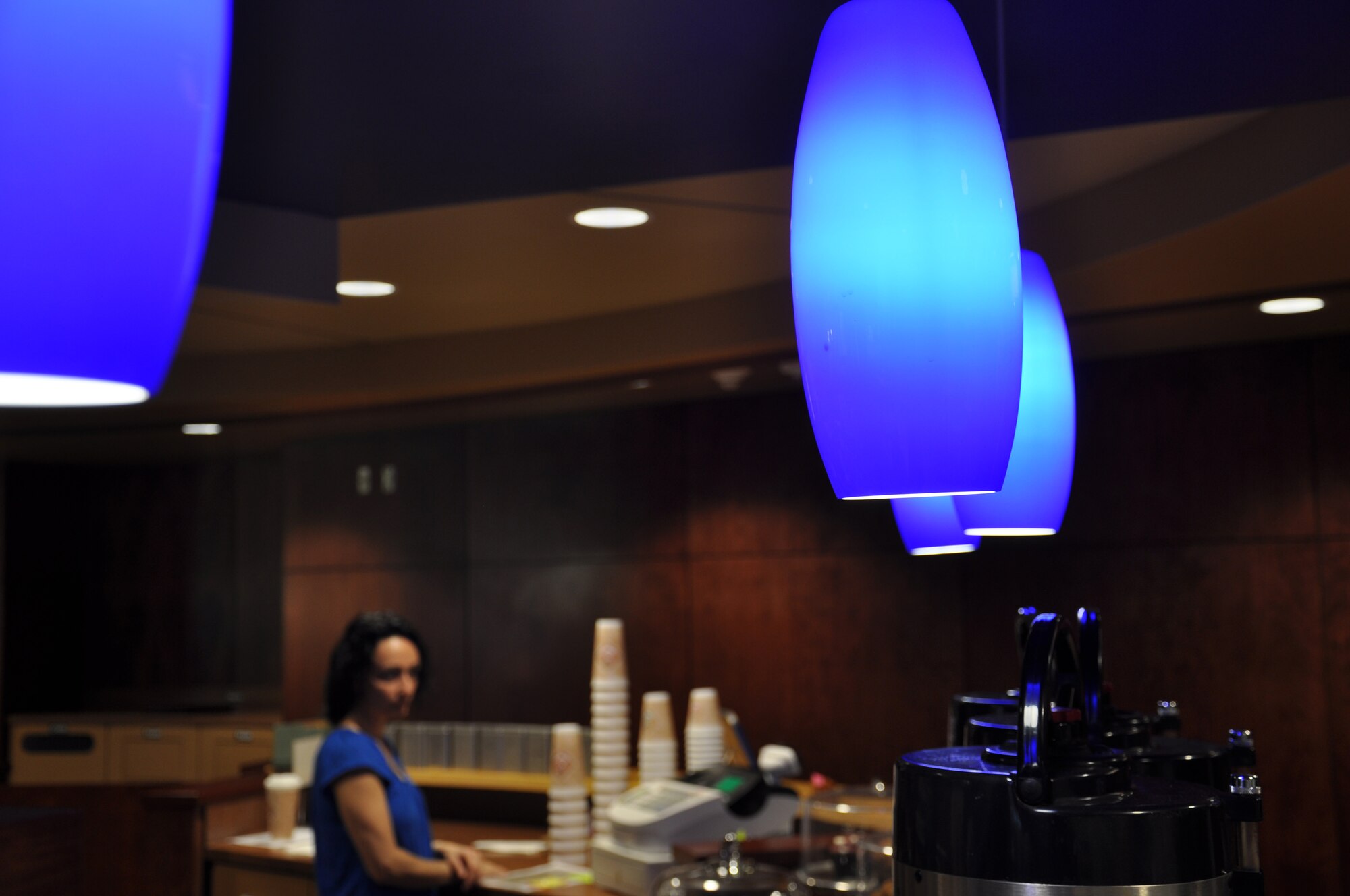 Asli Stewart enjoys a quiet moment between customers March 21, 2012, at the St.Louis Coffee Roasters located within the Global Reach Grill at Air Mobility
Command Headquarters, Scott Air Force Base, Ill.  St. Louis Coffee Roasters
is a popular stop for customers needing an energy boost. (U.S. Air Force photo/Theo Ramsey)