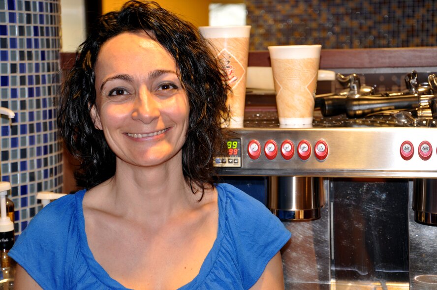 Despite not being a coffee drinker, Asli Stewart is a 5-year barista at
St. Louis Coffee Roasters, located within the Global Reach Grill at Air
Mobility Command Headquarters, Scott Air Force Base, Ill. Her favorite drink is hot chocolate with hazelnut flavor.  The Global Reach Grill provides breakfast, lunch and snack options to anyone with access to Scott Air Force Base. (U.S. Air Force photo/Theo Ramsey)