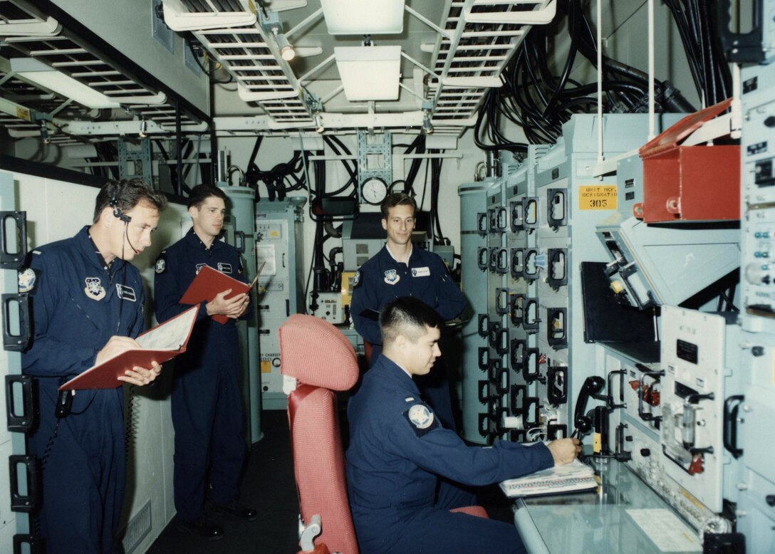 Missile combat crews underwent intense training, at the on-base training launch facility for several months before they were allowed to serve in an active missile field. Missileers were expected to learn vast amounts of technical data about the Minuteman systems, and when they were properly trained, they were expected to be nothing less than excellent at their duty. (U.S. Air Force courtesy photo)

