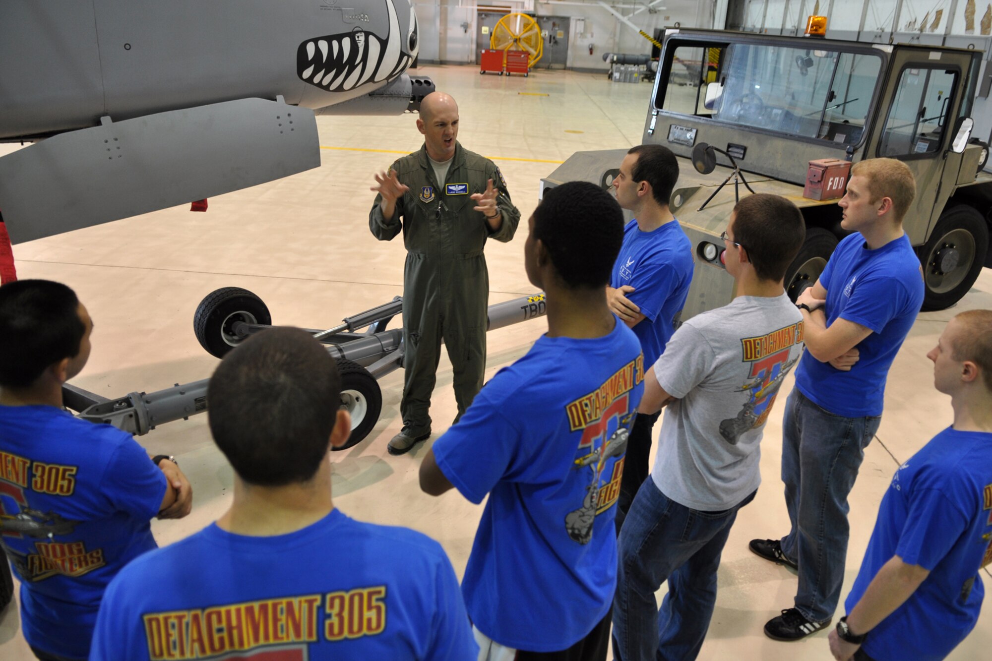 Maj. LaRue Russell, an A-10 Thunderbolt II pilot assigned to the 47th Fighter Squadron, explains how he scares the enemy into withdrawing from the battlefield with a “show of force” to a group of AFROTC cadets at Barksdale Air Force Base. La., March 31, 2012. The cadets are from the AFROTC Detachment, 305th Airpower Group, Louisiana Tech University. (U.S. Air Force photo by Master Sgt. Jeff Walston/Released)