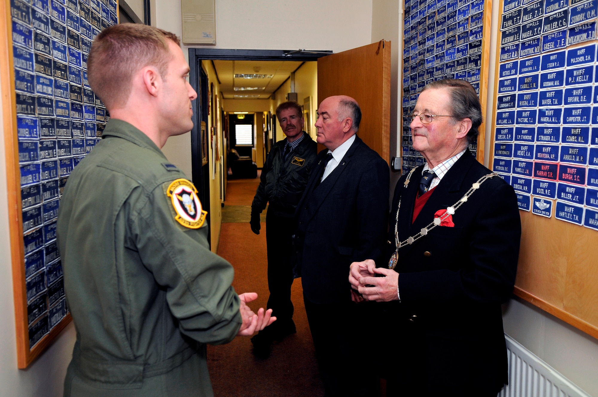 ROYAL AIR FORCE LAKENHEATH, England -- 1st Lt. David Kuhn, 493rd Fighter Squadron pilot, gives The Worshipful The Mayor of St. Edmundsbury, Councillor Christopher Spicer, a tour through the 493rd Fighter Squadron April 2, 2012.  Councillor Spicer toured the 493rd FS facilities to learn more about the history of the unit, to meet with the Airmen and to try on different equipment from the life support section.  (U.S. Air Force photo by Staff Sgt. Connor Estes)