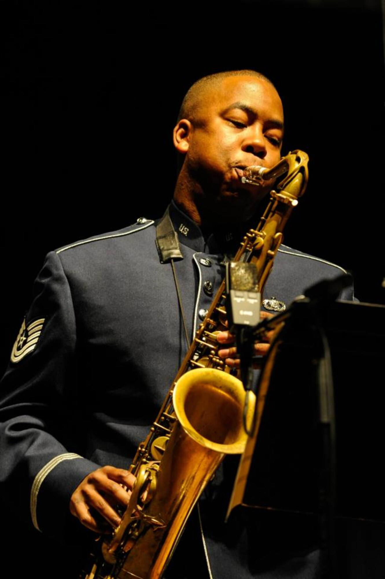 U.S. Air Force Tech. Sgt. Grant Langford plays the saxophone during an “Airmen of Note” performance in Damascus, Md., March 22, 2012. This Air Force jazz band will perform two free concerts April 14 at 7 p.m. at Grainger-Hill Performing Arts Center in Kinston, N.C., and April 15 at 3 p.m. at Fike High School Auditorium in Wilson, N.C. (Photo by Jim Mullen)