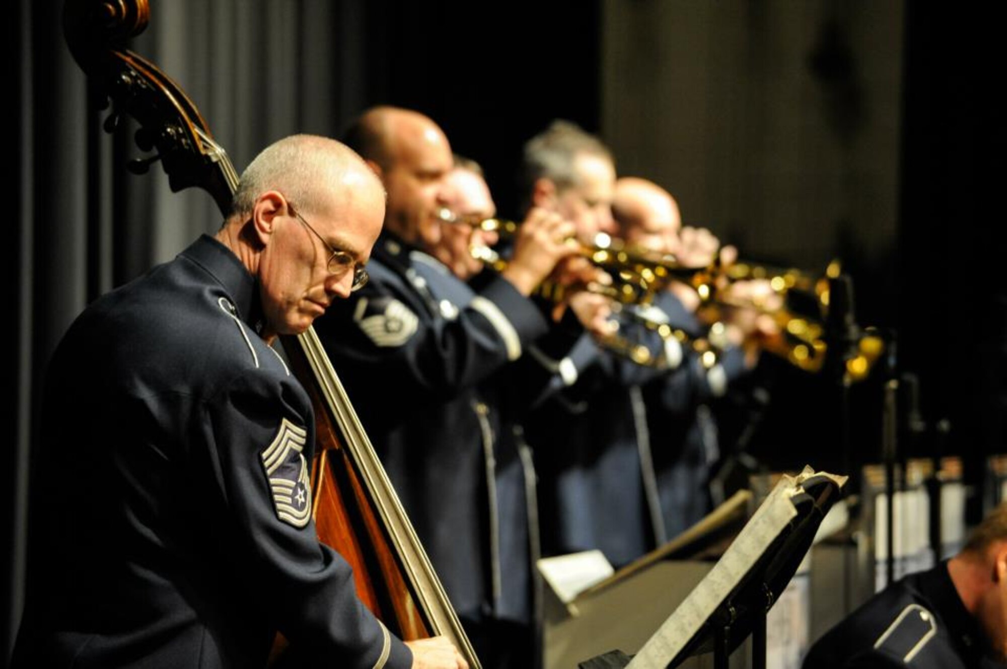 U.S. Air Force Chief Master Sgt. Paul Henry plays the cello during an “Airmen of Note” performance in Damascus, Md., March 22, 2012. This Air Force jazz band will perform two free concerts April 14 at 7 p.m. at Grainger-Hill Performing Arts Center in Kinston, N.C., and April 15 at 3 p.m. at Fike High School Auditorium in Wilson, N.C. (Photo by Paul Henry)