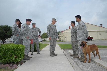 502nd Air Base Wing Command Chief Master Sergeant Jose A. LugoSantiago visits with the 902nd Security Forces Squadron, April 3. CMSgt LugoSantiago toured several 902nd Mission Support Group organizations during his visit. 
(U.S. Air Force photo/Joel Martinez)