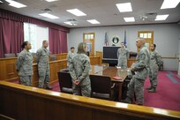 502nd Air Base Wing Command Chief Master Sergeant Jose A. LugoSantiago, visits with the 902nd Mission Support Group Judge Advocate Section, April 4.  CMSgt LugoSantiago toured serveral organizations of the 902nd MSG during his immersion tour at Joint Base San Antonio-Randolph. 
(US Photo by Joel Martinez)